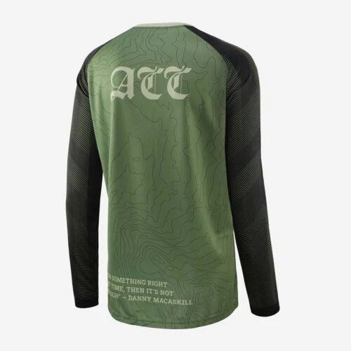 Reverse view of long sleeved top with olve green and black pattern